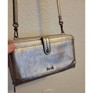 The sak crossbody clutch silver perfect condition brand new removable crossbody